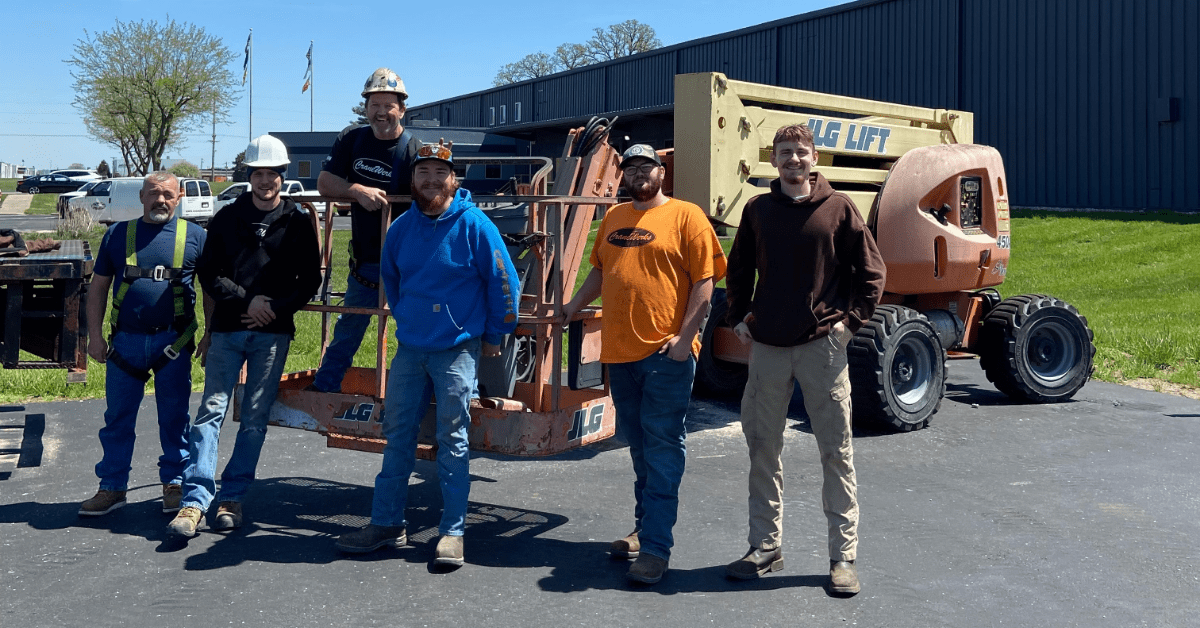 The CraneWerks install crew participating in operator training for Fork Truck, MEWP (mobile aerial work platforms) Carry Deck Crane, and Telehandler training.