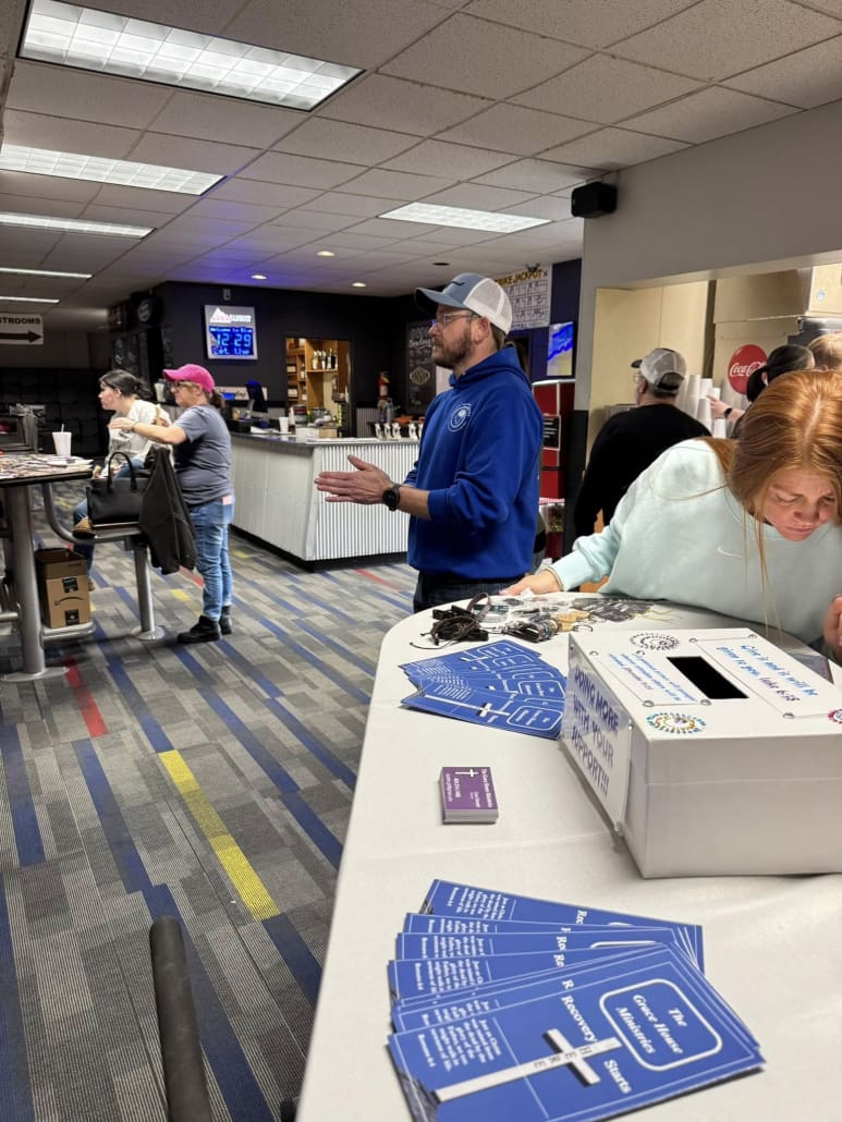 Thomas Miller clapping at Blue River Bowl in Shelbyville Indiana for their Strikes for a Cause event supporting those struggling with homelessness, addiction, and mental health.